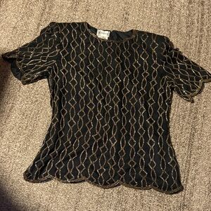 Stenay Elegant Black Top with Gold Accents